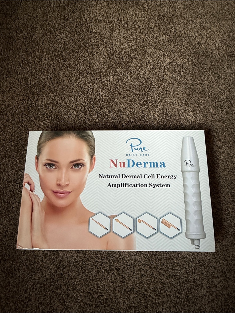 Pure Daily Care NuDerma Skincare Device in White